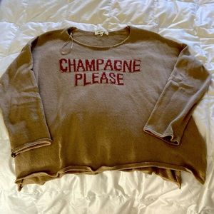 Champagne Please logo sweater.